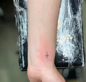 Cross Tattoo On The Wrist