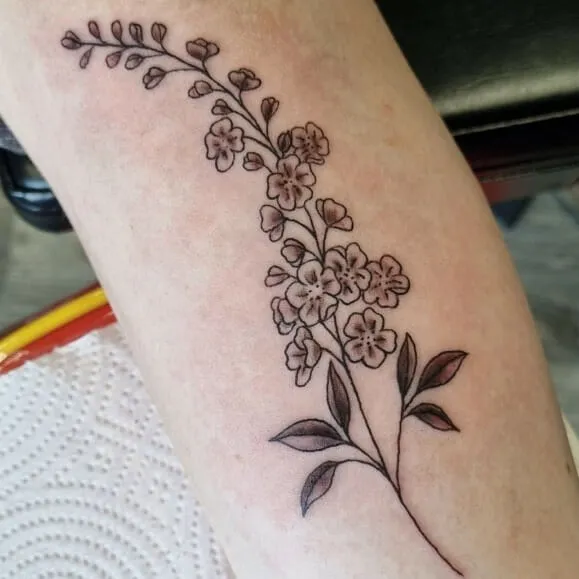 Cute July Birth Bloom Tattoo with Flower Stem 