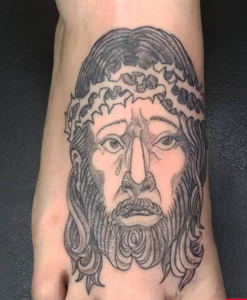 Jesus Tattoo On The Foot